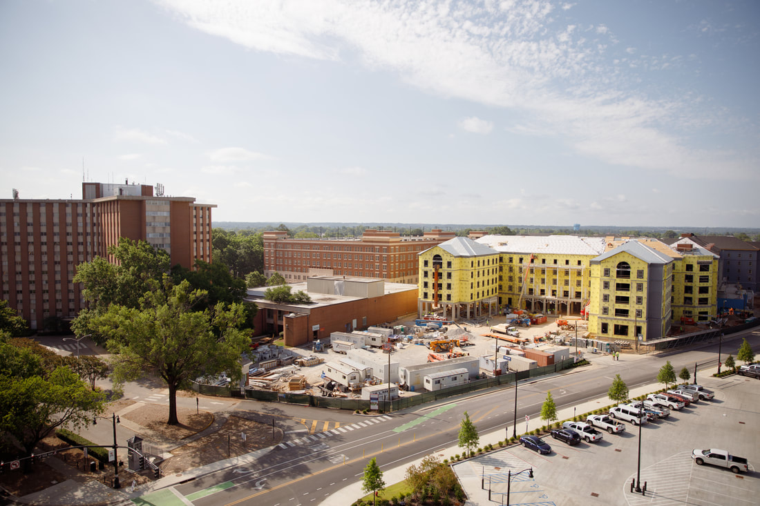 On the left shows the original Tutwiler dormitory, and on the right shows the new dorm being built. The new Tutwiler is official housing students as of Fall 2022. [Photo/The University of Alabama]Picture