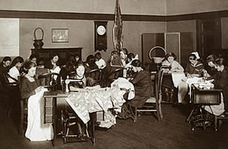 Immigrant women learning to sew