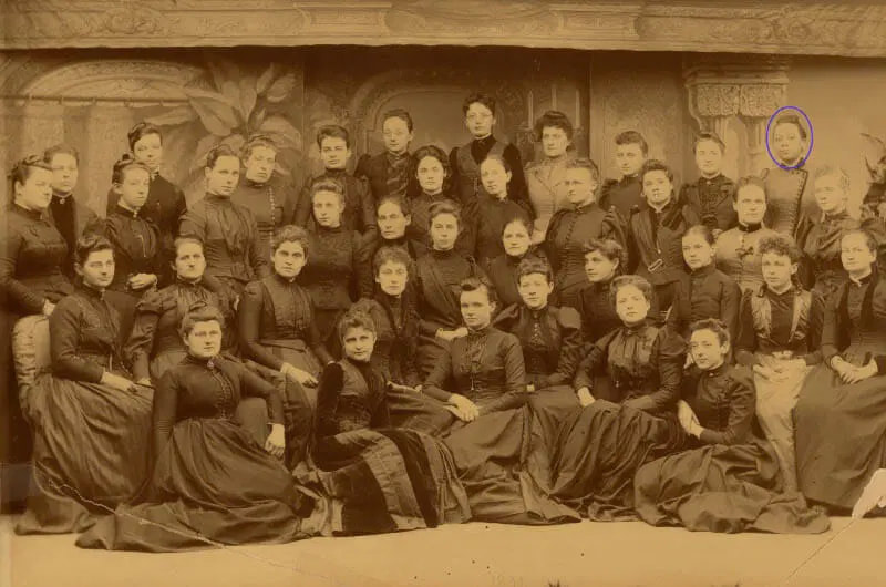 An 1891 class photo of nursing students. The subject, Halle Tanner Dillon,  can be found in the fourth row.